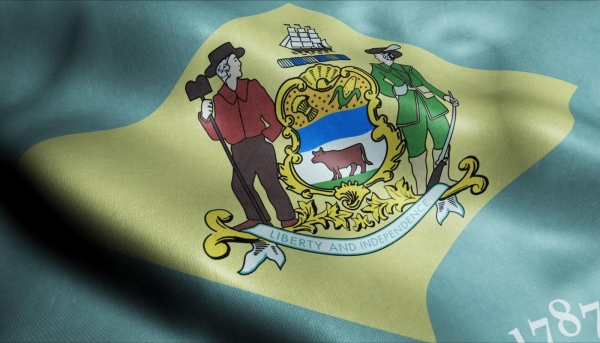 a close up of the waving flag of delaware