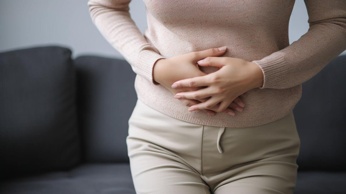 A woman holding her stomach